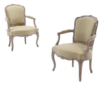 A pair of French Louis XV style painted open armchairs C 1900.