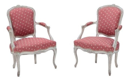 An elegant pair of French Louis XV style open arm chairs C 1900 .