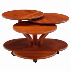 A set of three Danish MCM Niels Bach teak Model 53 mushroom nesting tables.