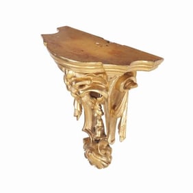A small French gilt and carved wood corbel shelf C 1880.