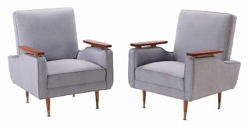 A pair of Danish Modern style lounge chairs in the manner of Finn Juhl C 1950.