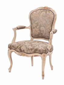 A French Louis XV style gilt and painted open armchair C 1900.