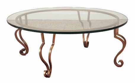 A gilt iron glass top coffee table in the manner of Maison Ramsay C 1975.