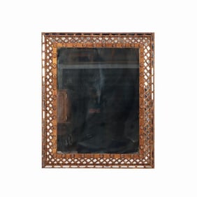 A gold mirror with lattice design C 1950.