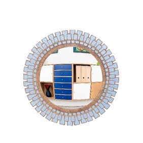 A large glass and resin convex mirror in the manner of Line Vautrin's "Gerbera" style .