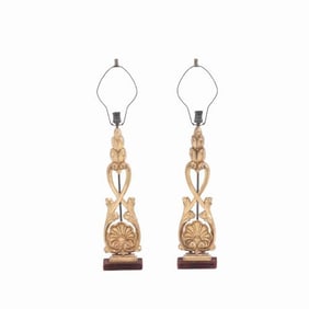 A pair of table lamps constructed from 19th century giltwood elements.