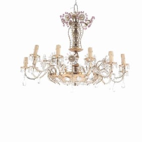A 12-arm brass and glass beaded chandelier C 1950.