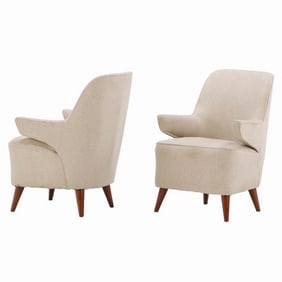 A pair of MCM upholstered lounge / tub chairs C 1950 .