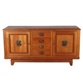 French oak sideboard C 1940 having two doors and four drawers with metal drawer pulls in the form of