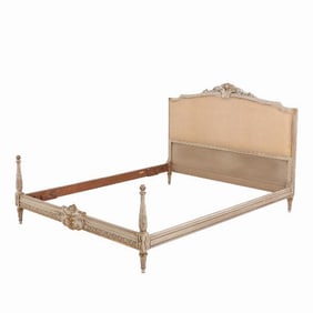 A Louis XVI style painted and gilt carved wood bed C 1930 .