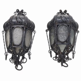 A pair of elaborate Italian wrought iron hanging lanterns C 1920.