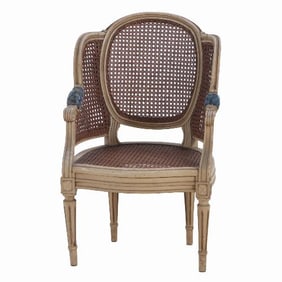 A French Louis XVI style child's size painted bergere chair C 1930.