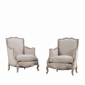 A Pair of French Louis XV style painted bergere chairs C 1920.
