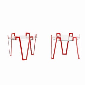 A pair of eye-catching red iron and glass end tables in the manner of Jean Royere  .