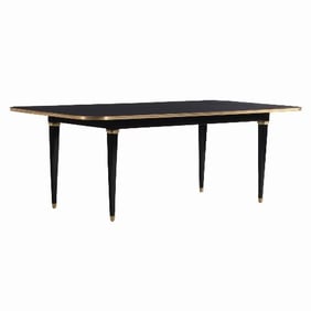 An elegant ebonized mahogany and bronze mounted dining table attributed to Maison Jansen C 1940.