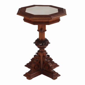 A carved walnut adjustable pedestal table 19th C.