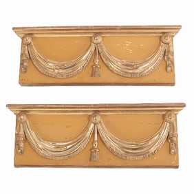A pair of Classical Italian Giltwood Decorated Overdoor Panels C 1890.