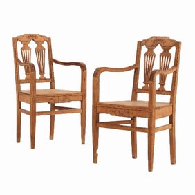 A pair of French Louis XVI style carved bleached oak armchairs C 1890.