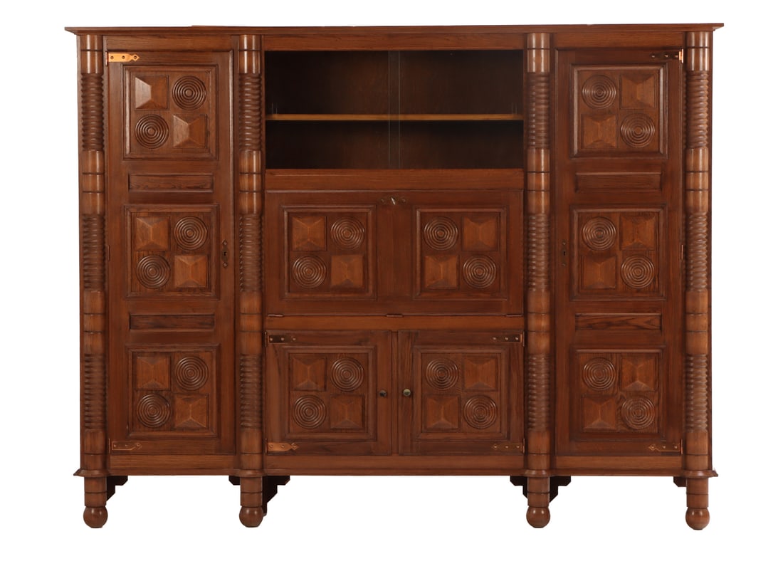 FRENCH OAK BAR CABINET BOOKCASE HAVING FALL FRONT BAR, ADJUSTABLE SHELVING AND GEOMETRIC MOTIFS IN (1 of 9)