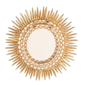 CARVED AND GILTWOOD STARBURST MIRROR C 1970.