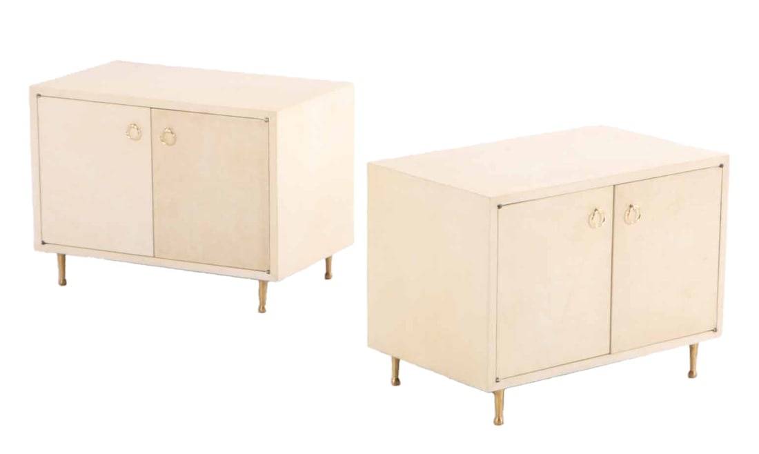 PAIR OF PARCHMENT COVERED TWO DOOR CABINETS HAVING BRONZE HARDWARE AND LEGS C 1950 IN THE MANNER OF (1 of 6)