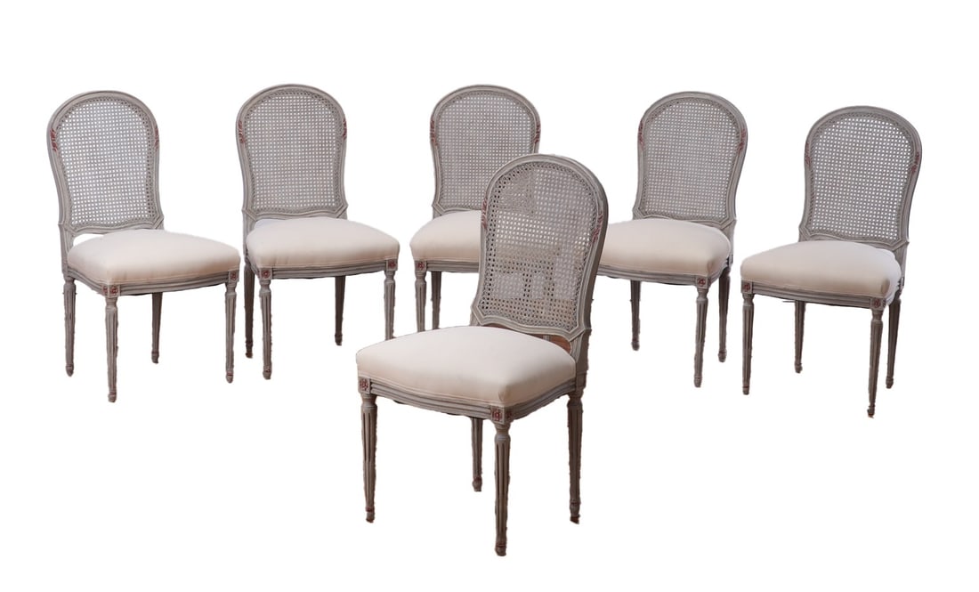SIX PAINTED LOUIS XVI STYLE DINING CHAIRS HAVING CANE BACKS AND NEW FABRIC C 1940.: Six painted Louis XVI style dining chairs having cane backs and new fabric C 1940. Ht: 37" Wd: 19.5" Dpth: 16.5" Seat: 17.5"