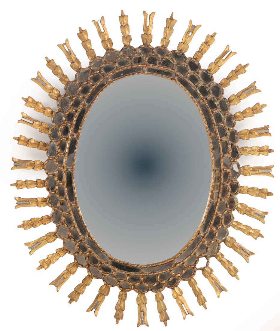 LARGE CARVED AND GILTWOOD SUNBURST MIRROR C 1960. (1 of 4)