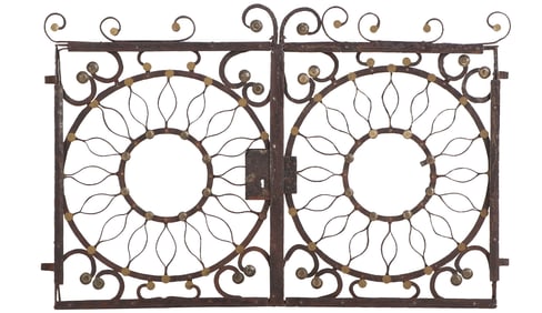 WHIMSICAL PAIR OF WROUGHT IRON AND BRASS GARDEN GATES WITH CIRCULAR DESIGN C 1920.