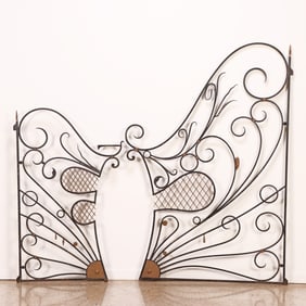 TWO FRENCH ART NOUVEAU STYLE WROUGHT  IRON GARDEN GATES IN THE FORM OF A BUTTERFLY WING C 1930.