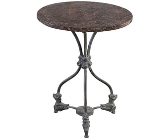 AN ANTIQUE WROUGHT IRON PUB TABLE HAVING MARBLE TOP AND RESTING ON FIGURAL FEET