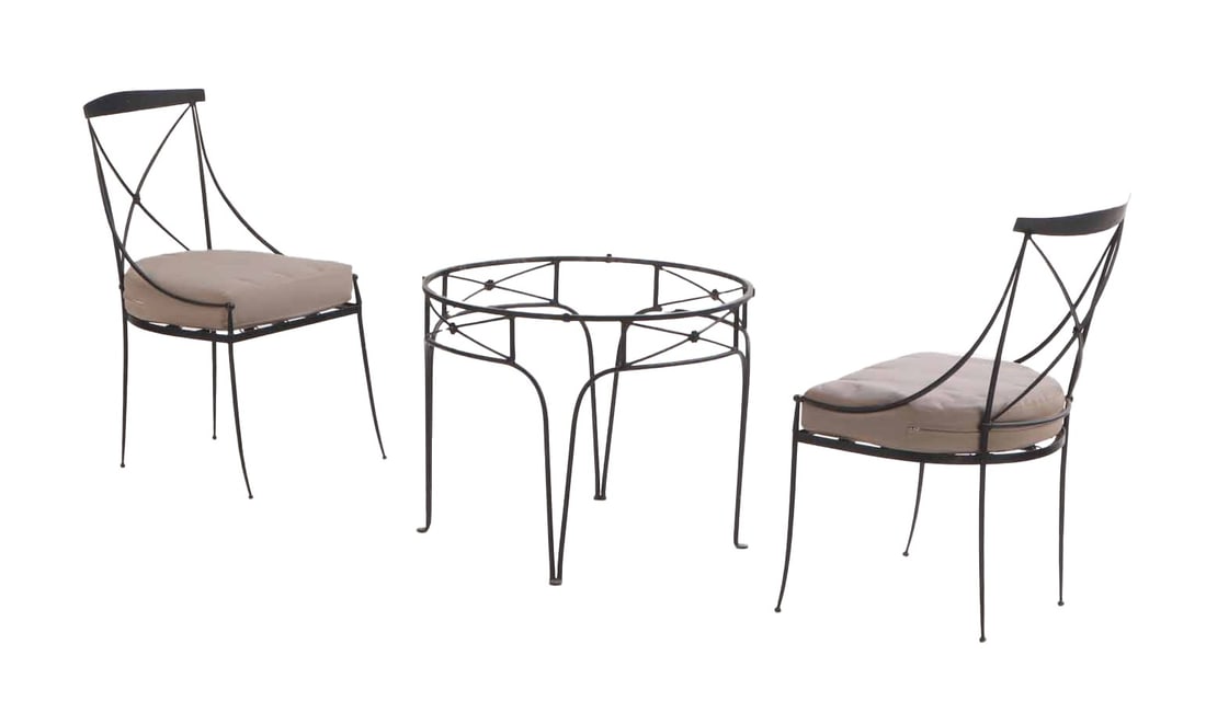 TWO REGENCY STYLE IRON CHAIRS WITH MATCHING TABLE ( LACKING GLASS) ATTRIBUTED TO COMTE C 1950. (1 of 9)