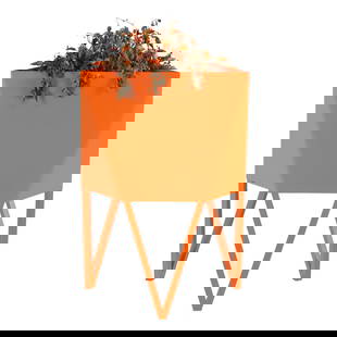 A LARGE DECA STEEL PLANTER IN CUSTOM ORANGE POWDER COATED FINISH: A large Deca steel planter in custom orange powder coated finish. The planter having a unique geometric pattern that is triangular at the top and hexagonal at the base, with optional drainage holes. H