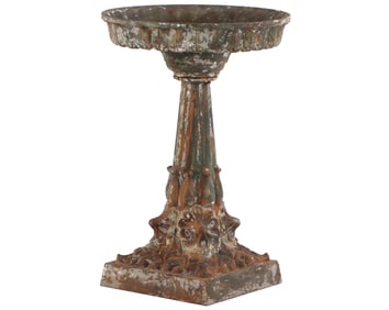 NINETEENTH CENTURY CAST IRON GARDEN URN OR FOUNTAIN WITH FLORAL MOTIF.