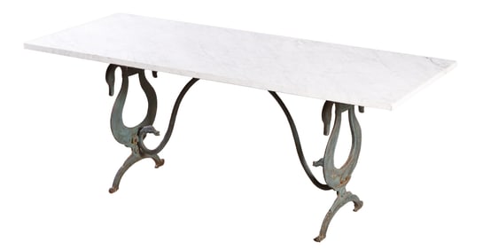 CAST IRON SWAN FORM TABLE BASE HAVING A WHITE MARBLE TOP.