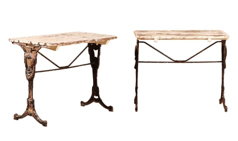 PAIR OF ART NOUVEAU CAST IRON BISTRO TABLES HAVING PAINTED WOOD TOPS C 1920.