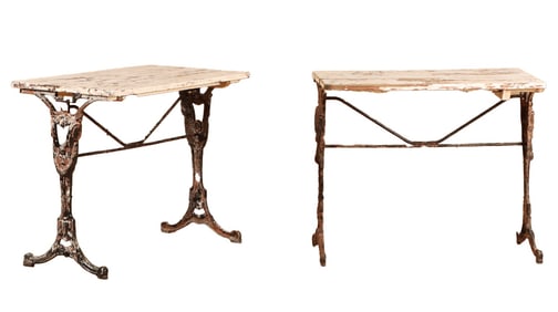 PAIR OF ART NOUVEAU CAST IRON BISTRO TABLES HAVING PAINTED WOOD TOPS C 1920.