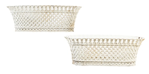 PAIR PAINTED CAST IRON OBLONG PLANTERS HAVING A BASKET WEAVE DESIGN.