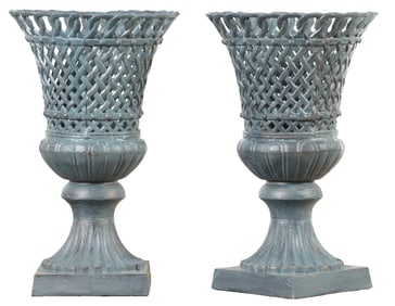 PAIR PF PAINTED CAST IRON GARDEN URNS WITH BASKET WEAVE DESIGN.