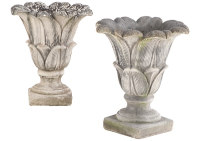 PAIR OF FRENCH CAST STONE GARDEN URNS DEPICTING A LONG PETAL FLOWER C 1970.