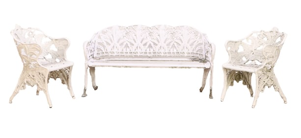 A PAIR OF CAST ALUNIMUM FERN PATTERN GARDEN CHAIRS AND A LILLY OF THE VALLEY CAT ALUMINUM GARDEN