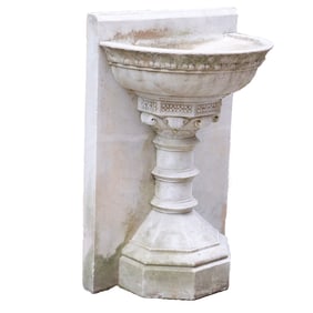 NINETEENTH CENTURY ROMANESQUE CARVED MARBLE FRONT HAVING A TURNED SUPPORT WITH CARVED CAPITAL.