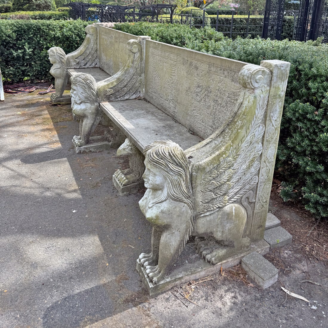 GRAND CARVED MARBLE ENGLISH STYLE ESTATE BENCH HAVING WINGED SPHINX DECORATION. BREAKS DOWN INTO (1 of 4)