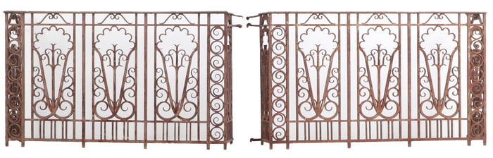 A GOOD PAIR OF FRENCH ART DECO IRON BALCONY PANELS IN THE MANNER OF EDGAR BRANDT C 1930.