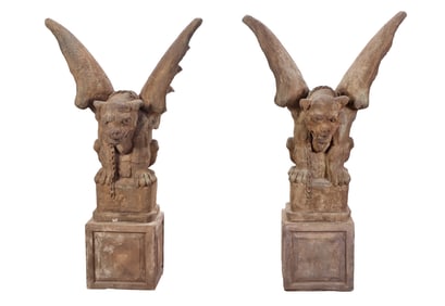 64" H PAIR OF CAST STONE WINGED GARGOYLES RESTING ON SEPARATE BASE.