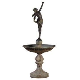 A 68" BRONZE FIGURAL FOUNTAIN DEPICTING A FEMALE FIGURE RAISED ON A SPHERE.