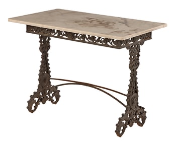 ITALIAN CAST IRON MARBLE TOP GARDEN TABLE C 1880 WITH PIERCED SKIRT AND BALL DECORATION.