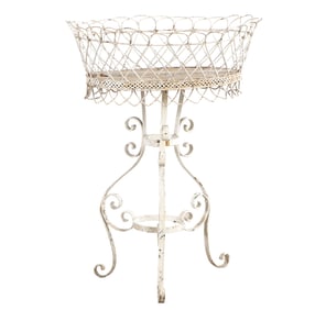 WROUGHT IRON PLANTER BASKET.