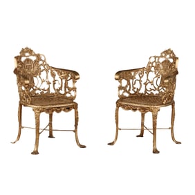 PAIR PAINTED CAST IRON GARDEN CHAIRS DESIGNED BY ADAMS FOUNDRY OF PHILADELPHIA.