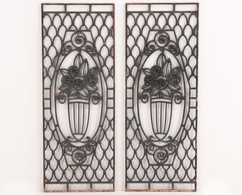 PAIR FRENCH ART DECO CAST IRON PANELS C 1930 WITH FLORAL MOTIF.
