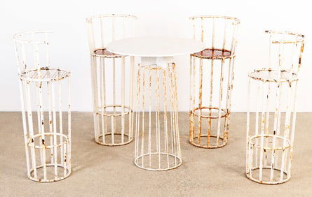 FRENCH FIVE PIECE PAINTED IRON BISTRO SET IN THE MANNER OF JEAN ROYERE C 1960.
